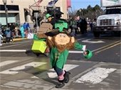 Leprechaun marches in parade down Washington Avenue