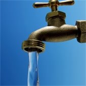 Image of water flowing our of a tap.